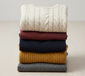 Diverse fabric rolls.